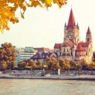 View over the river at the church Heiliger Franz of Assisi at Mexikoplatz, Vienna, Austria