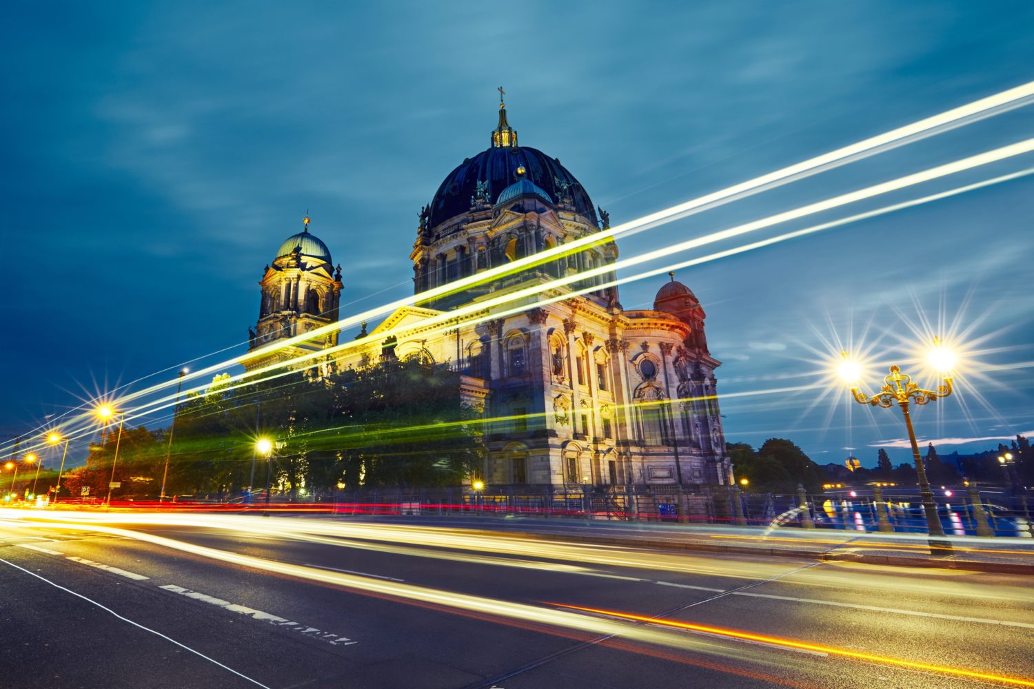 Museum Island with Berlin Cathedral with busy traffic lights in the foreground