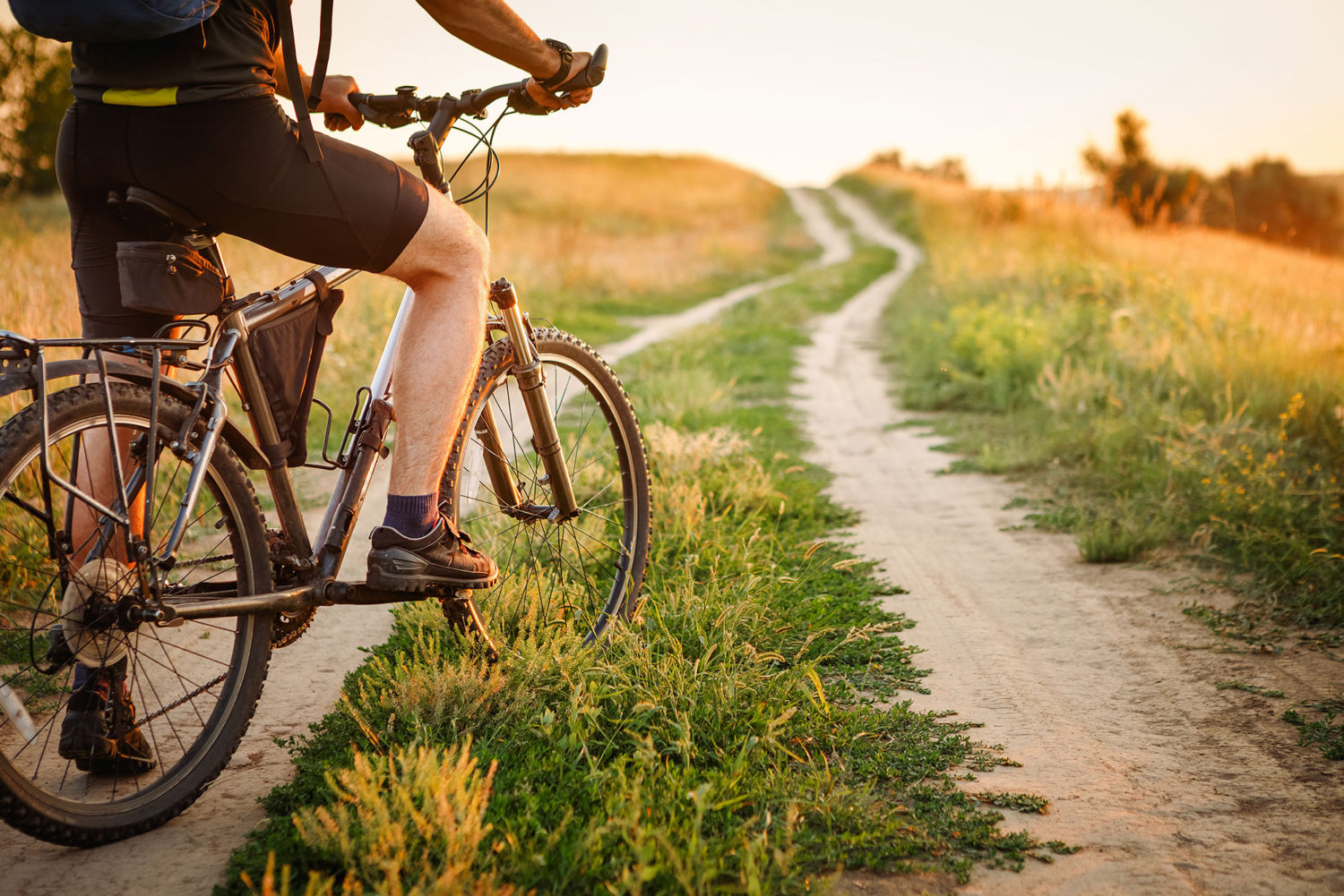 Cyclist on a small countryside road